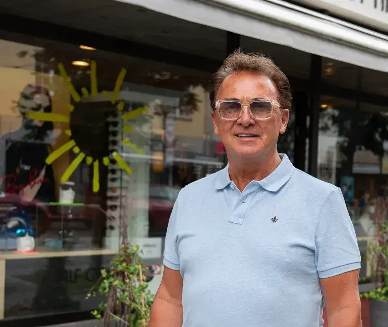 Optician Alf Opheim outside the shop in Vangsgata